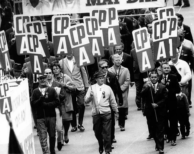 1 May 1966 members of the Communist Party of Australia (CPA) marching in a May Day rally in Sydney/ ASIO Record, NAA: A9626, 150.